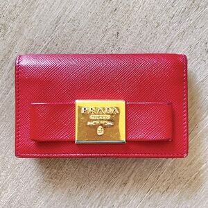 Prada saffiano leather card holder 
Red 
Minor wear sign